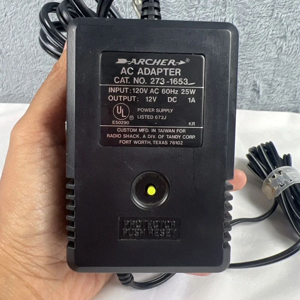 ARCHER AC ADAPTOR INPUT 120 V AC 60HZ 25W OUTPUT 12 V DC IA CAT. NO.‎ 273-1653